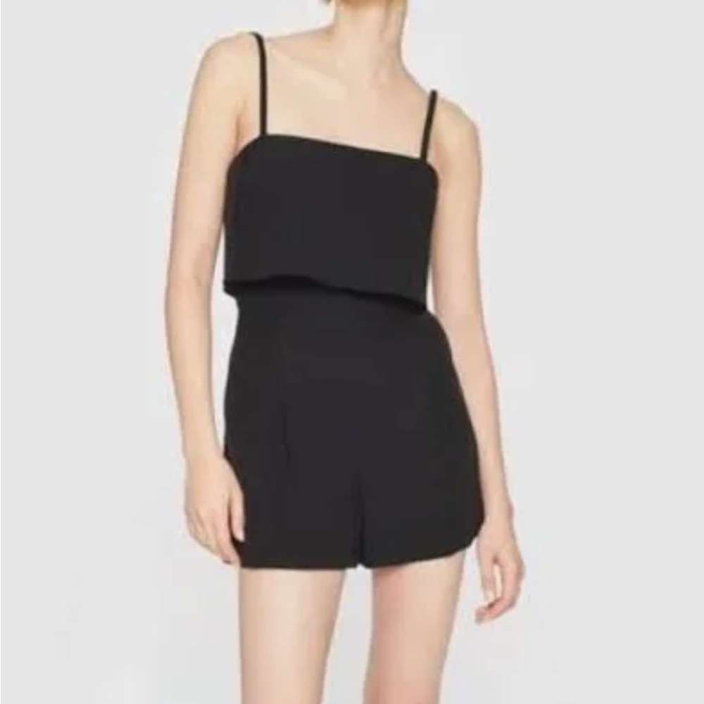 Club Monaco pique-knit romper in black size 2, adjustable straps, side pockets